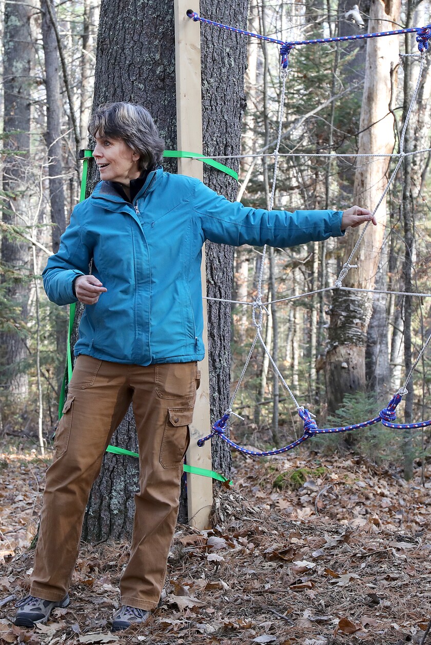 Lori Danz, the Superior School Forest coordinator and science teacher at Superior High School, explains a team building challenge