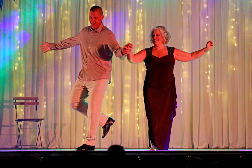 Dancer perform on stage.