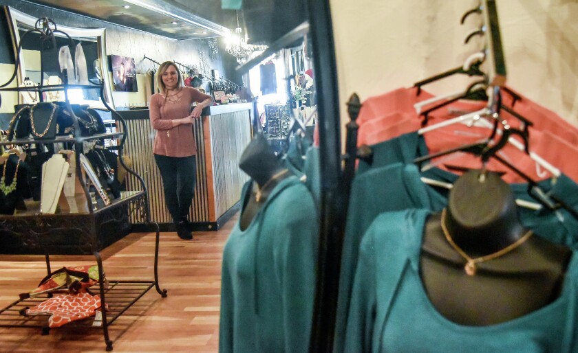 Megan Reimnitz recently took over as owner of Adorn Boutique located at 116 N. Main Street in downtown Mitchell. (Matt Gade / Republic)