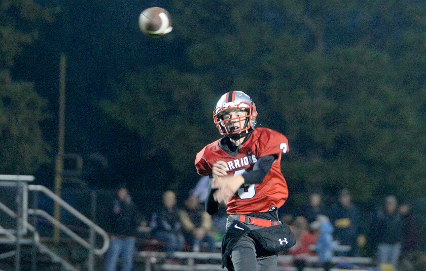 BOLD sophomore Jack Gross throws on the run during a Mid State 3 District game against KMS on Friday, Sept. 23, 2022 at Olivia.
