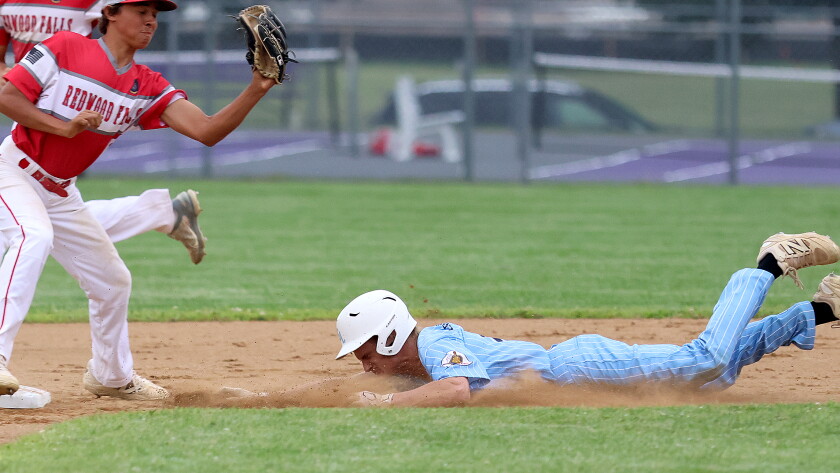 Glenwood-Lowry's Aron Majerus, right, slides safely into second base for a steal during a Division II West Central Sub-State Legion baseball playoff game against Redwood Falls on Thursday, July 23, 2026 at Montevideo.