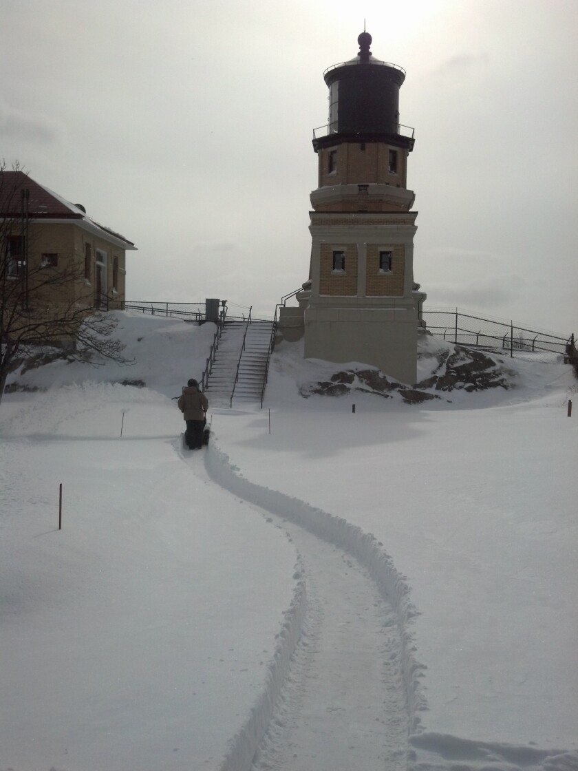 Lee Radzak blowing snow at Split Rock in 2014