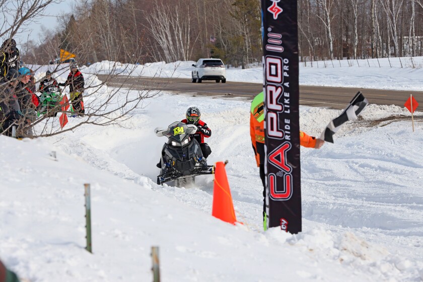 Snowmobilers race