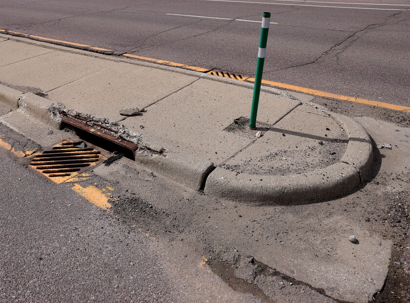 Storm Drain and curb deterioration on the divider on Oxford St. in Worthington.