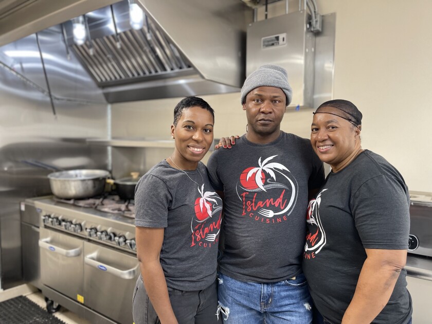 From left, Island Cuisine owner Lamise Oyugi, Chef Joseph Grant and prep cook Annette Greensword are pictured.