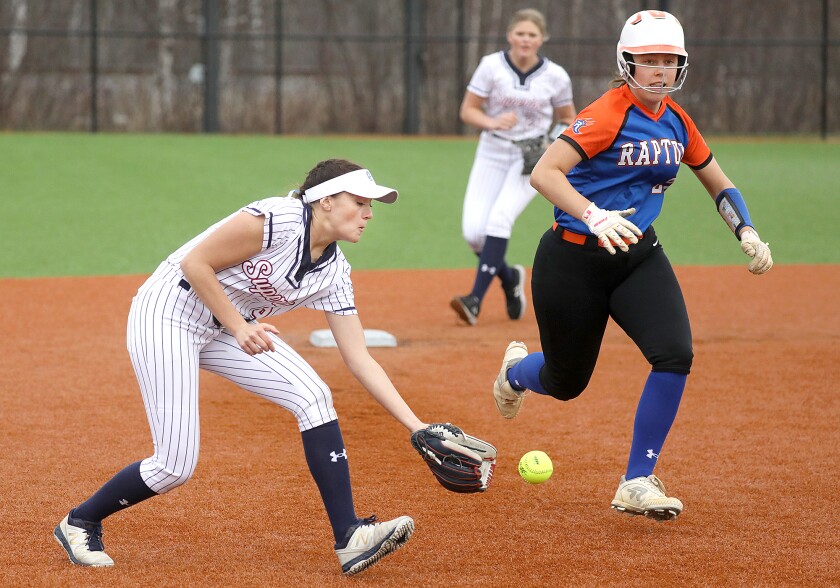 Superior’s Natalee Sigfrids (9) fields a grounder to short before tagging out Carlton-Wrenshall’s Janea Sjodin (21)
