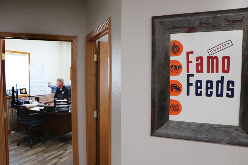 A vintage feed package is framed outside the office of the Famo Feeds Inc., president, John Beste.