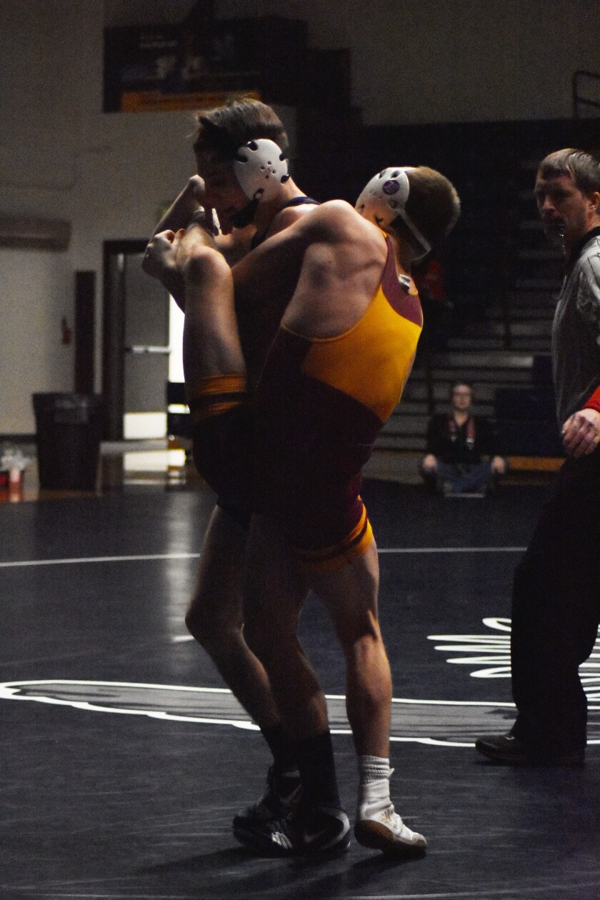 Dickinson State junior Jaime Mullins battles with Kolton Roth of Northern State (S.D.) on Dec. 7, at Scott Gym. (Shelby Reardon / The Dickinson Press)