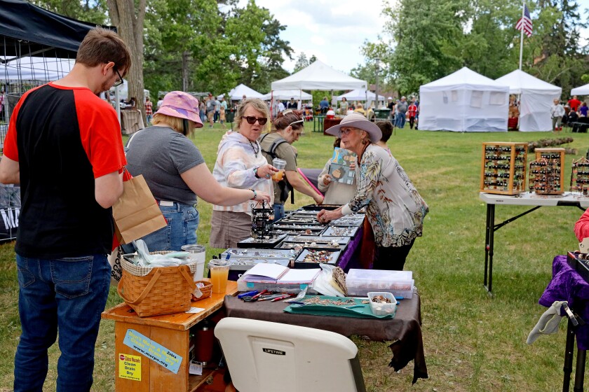 People attend Arts in the Park on Sunday, June 26, 2022, at Gregory Park in Brainerd.