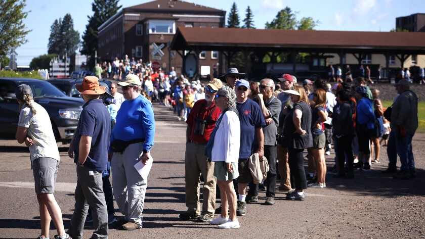 People standing in line.