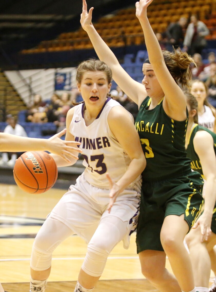 Winner's Bella Swedlund backs down Aberdeen Roncalli's Megan Streier (3) at the State A girls basketball tournament this past season in Sioux Falls. (Nick Sabato / Republic)