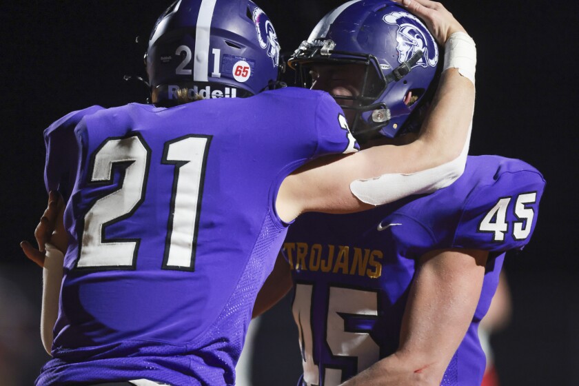 high school boys playing football