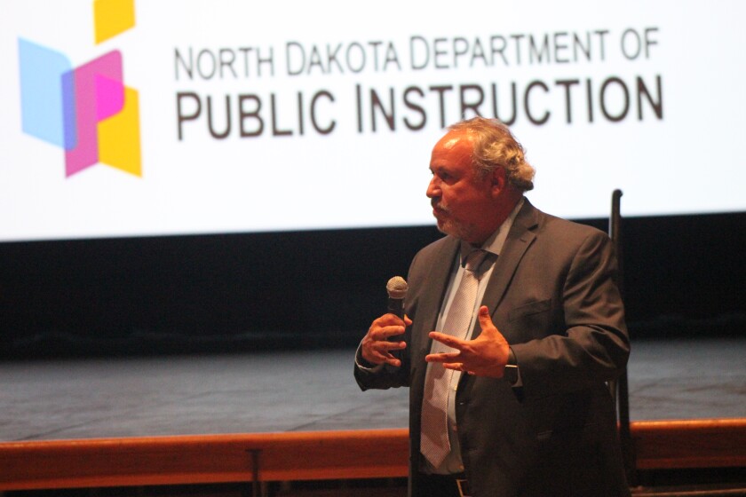 Nick Archuleta, president of North Dakota United teachers association, said that members are opposed three to one to carrying firearms in schools during a school safety forum at Fargo South High School on Monday, Aug. 27. Kim Hyatt/ The Forum