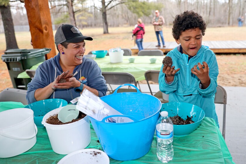 Earth Day activities at Rotary Riverside Park in Brainerd.