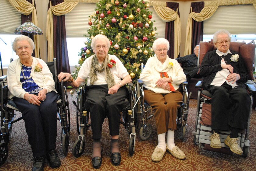TOM CHERVENY | FORUM NEWS SERVICE Family and friends gathered at the Clarkfield Care Center on Wednesday to celebrate Centenarian Day in honor of four residents who are age 100 and over, two of whom celebrated their birthdays. The honored ladies are seated, left to right: Angie Lee, 110; Eunice Anderson, 102; Grace Larson, 100; and Elsie Husby, 101.