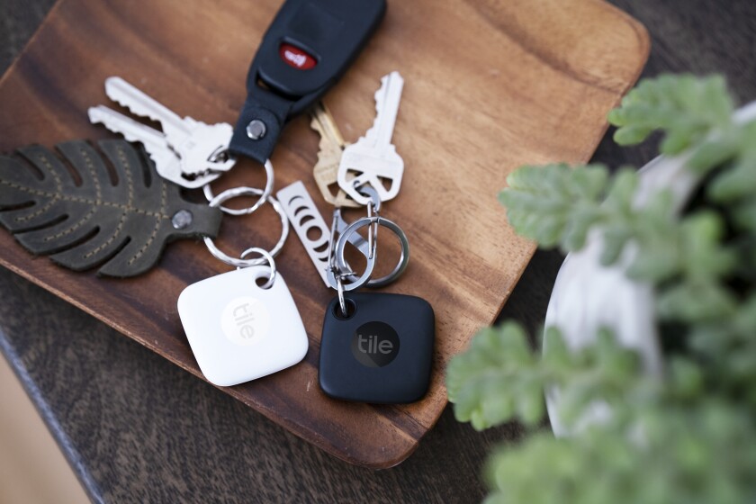 A Tile tracker is attached to a set of keys