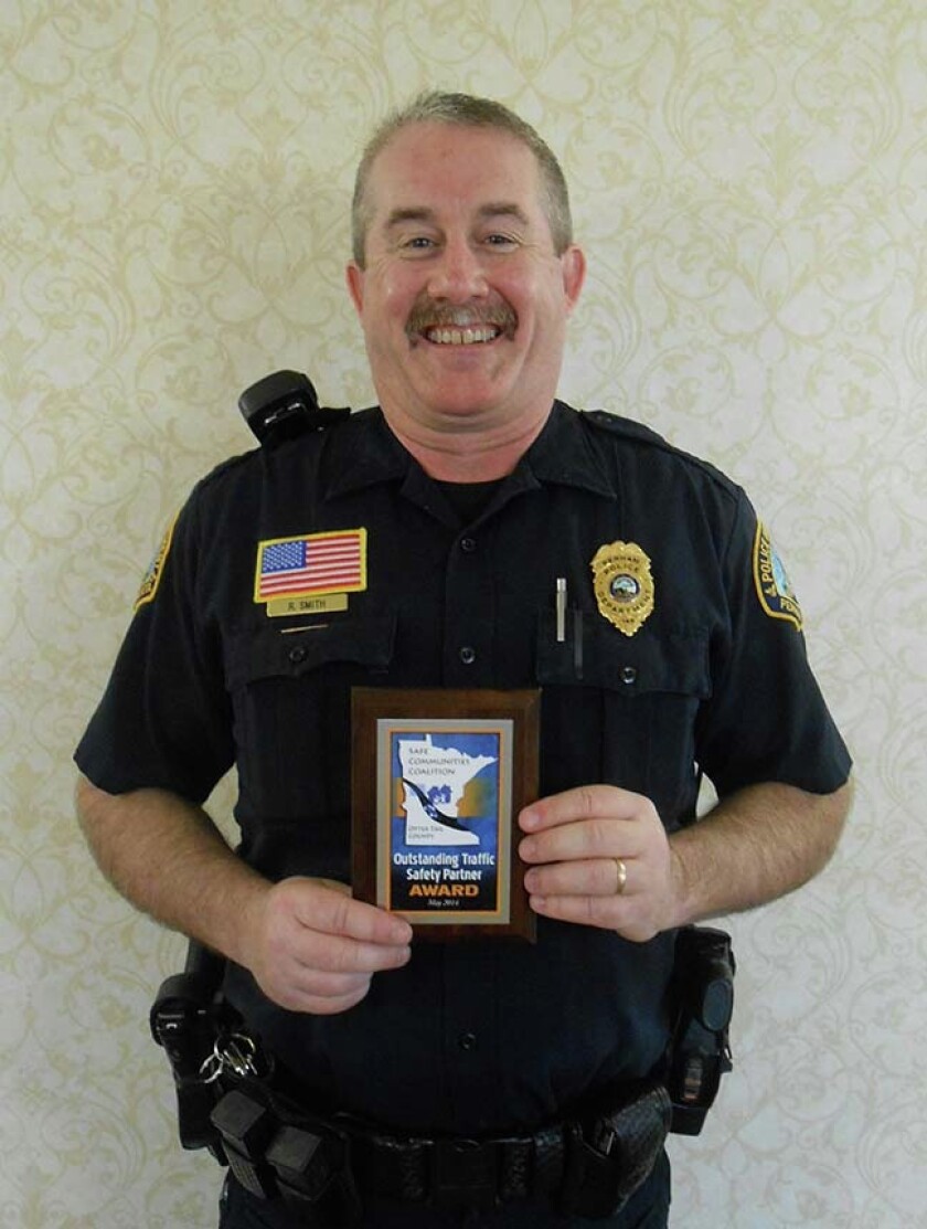744408+0522_NEWS_OfficerAwardW.jpg