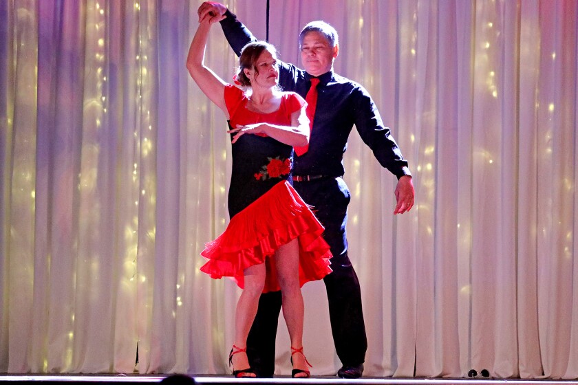 Dancer perform on stage.