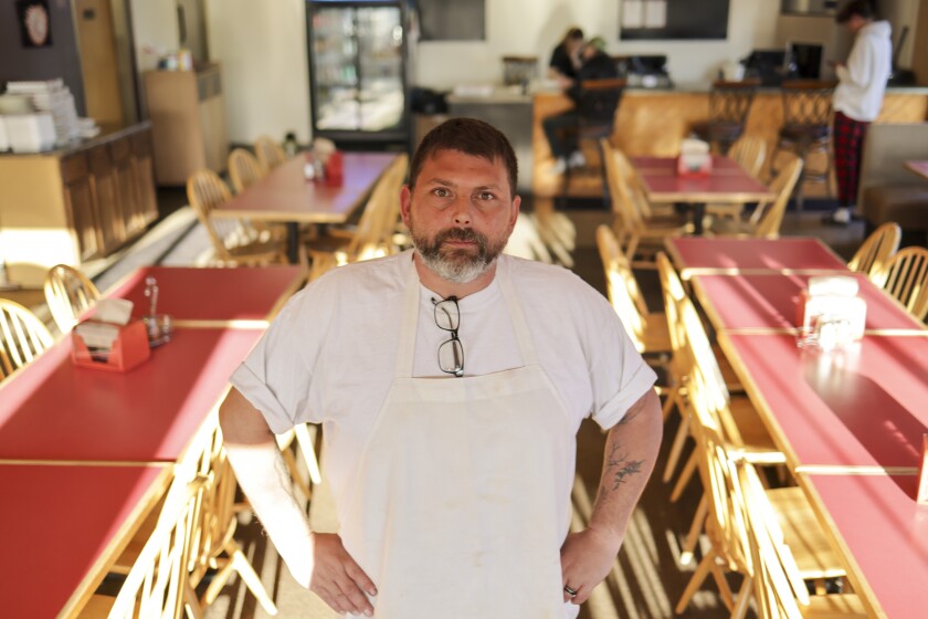 Man working in pizza restaurant