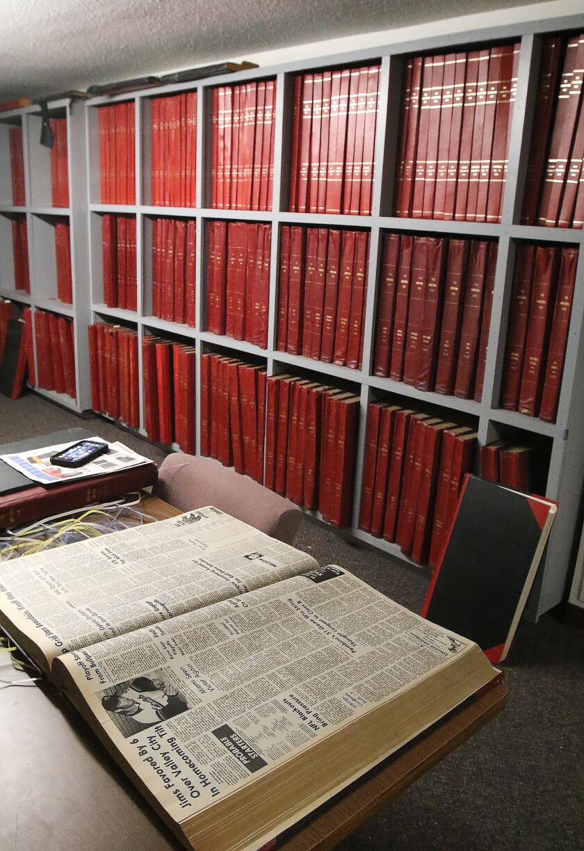 sun archive removal all dem books 082922.jpg