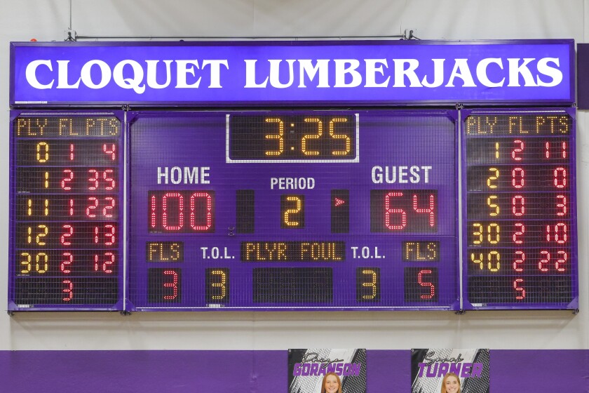 high school boys play basketball