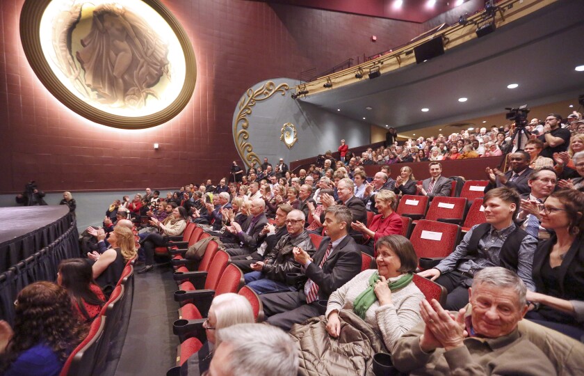 People attending Duluth Mayor Emily Larson’s State of the City speech at the restored NorShor Theatre applaud during the address. Steve Kuchera / skuchera@duluthnews.com