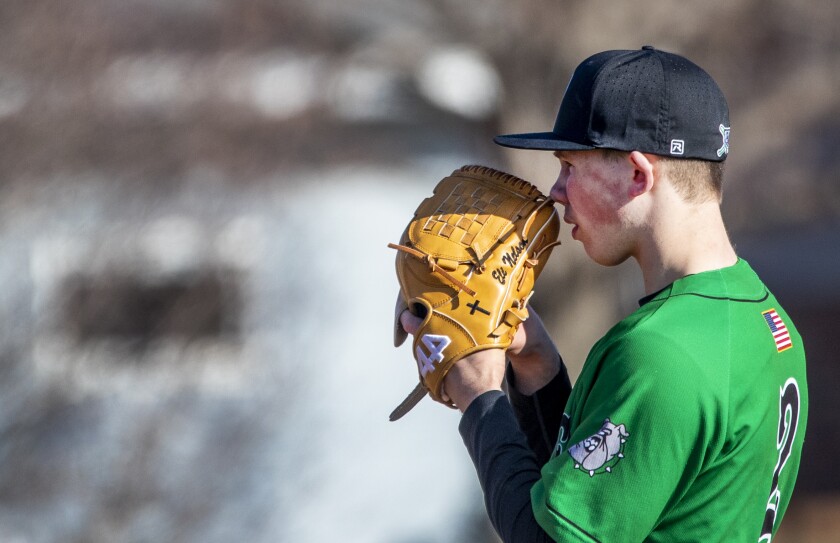 Paynesville pitcher Eli Nelson stares down his next pitch while taking on New London-Spicer at home on Monday, April 11, 2022.