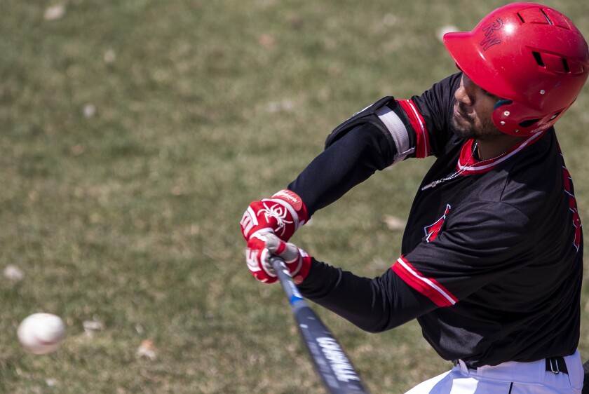 Warrior Tyler Traphagen hits an incoming pitch while taking on Central Lakes College at Green Lake Baseball Diamonds in Spicer on Wednesday, April 27, 2022.