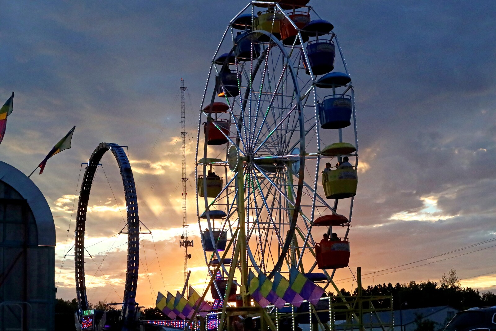 People enjoy the Crow Wing County Fair midway.
