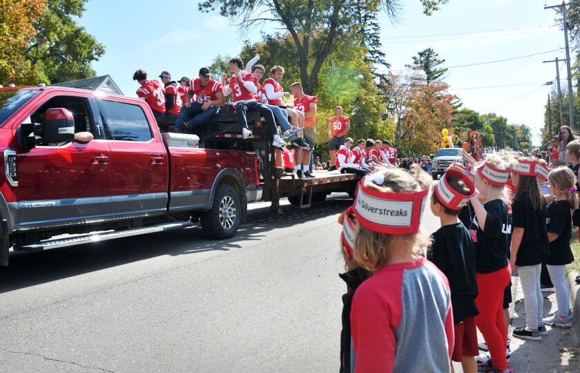 Kids watching homecoming parade