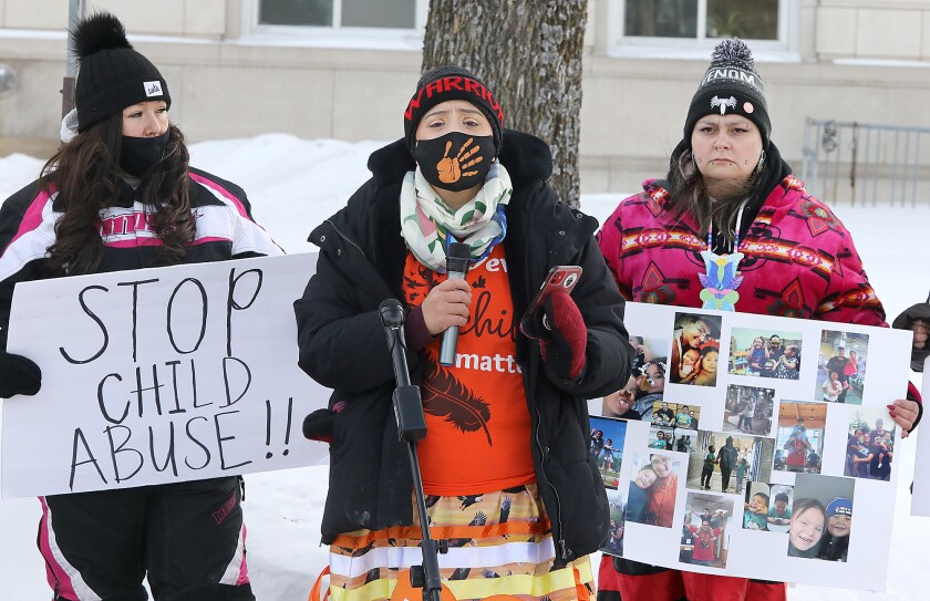 Jessica Gidagaakoons Smith speaks during a news conference about alleged child abuse in Cloquet foster home