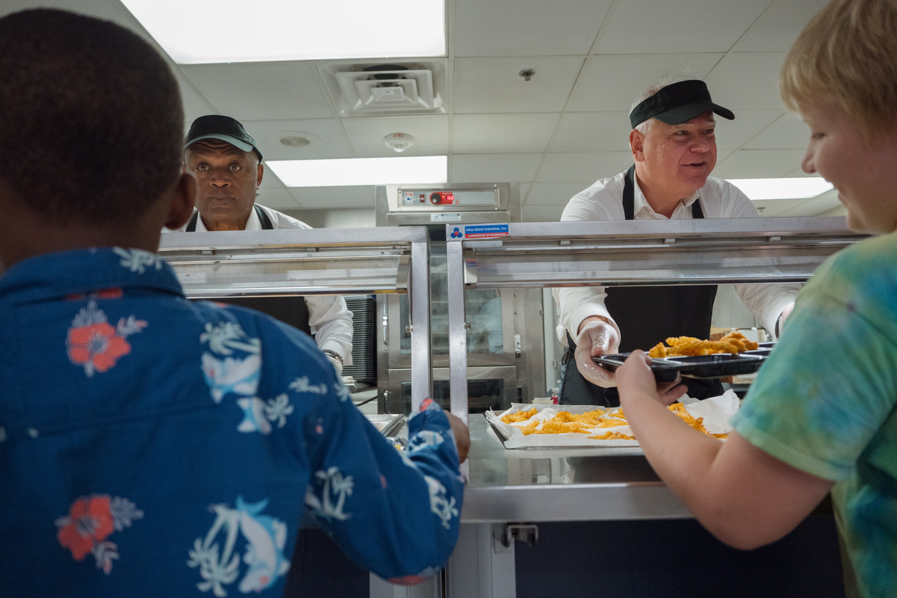 Gov. Tim Walz dishes out lunch to Rochester kids during visit to