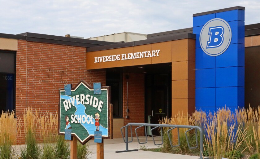 Exterior shot of the entrance of Riverside Elementary School.