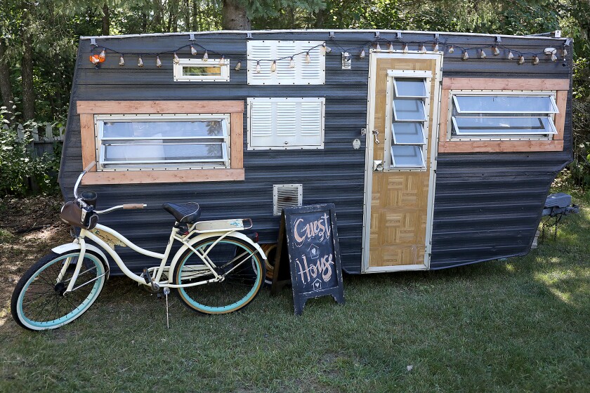 Heidi Breggeman’s renovated camper rests in her backyard in Willow River