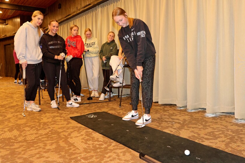 Meredith Holmstrom putts the ball during golf practice on Wednesday, April 9, 2025, at Madden's Resort.