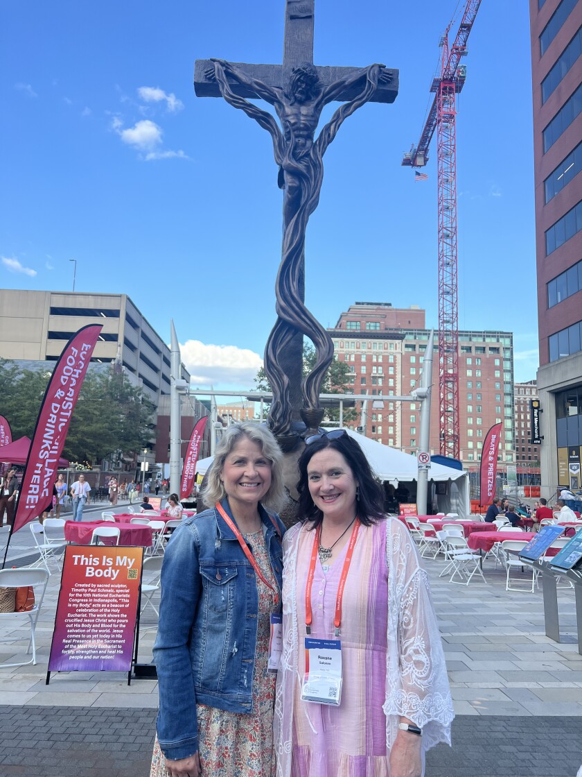 Roxane and Joanne in front of NEC crucifix.jpg