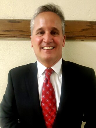 Headshot of Eric Schneider