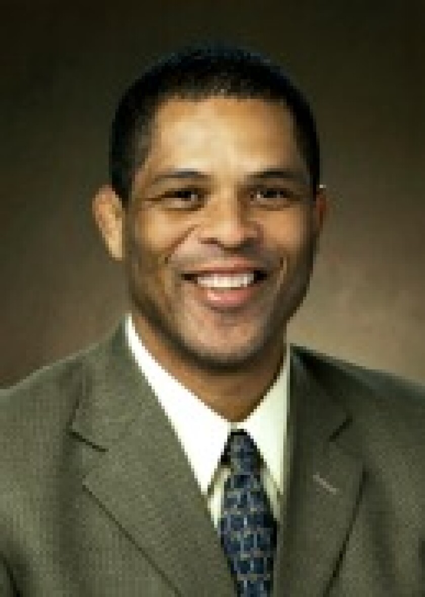 Moorhead announced the hiring of Kenard Booker, center, as the new head wrestling coach. Submitted photo