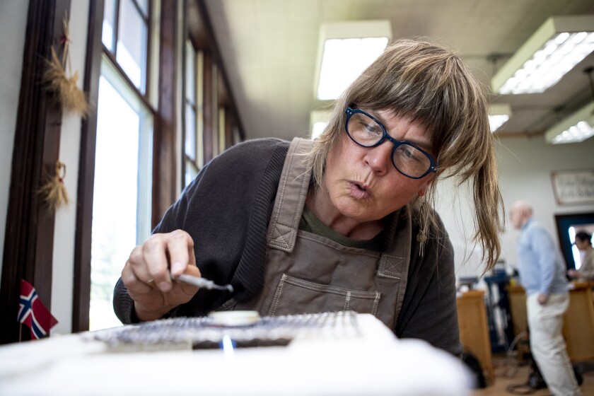Kate Mudge practices soldering silver in a class at Milan Village Arts School during the 16th annual "A Taste of Syttende Mai," Saturday, May 14, 2022. In the past, the class has been open for public viewing but was not this year due to the COVID-19 pandemic.