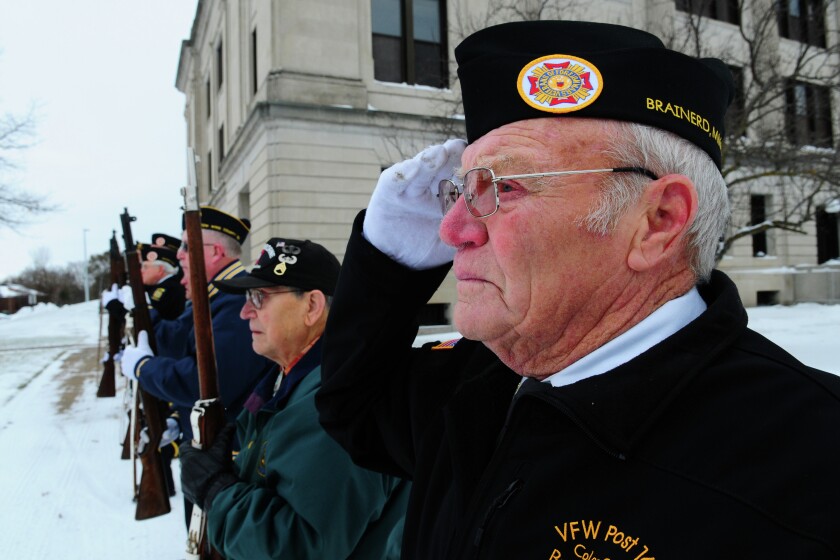 Brainerd VFW Color Guard member Matt Gilgenbach salutes during a ceremony at the All Veteran’s Memorial this morning near The Crow Wing County Historic Court House. Brainerd Dispatch/Steve Kohls