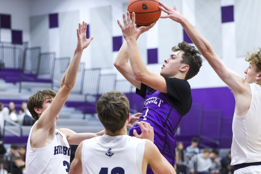 high school boys play basketball
