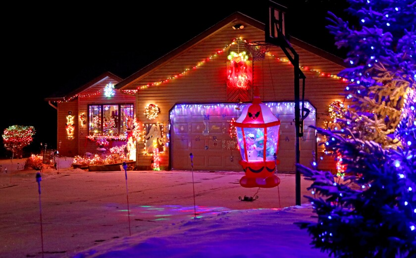Holiday lights around a home.