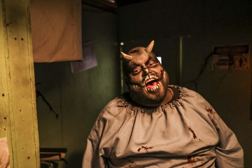 actors perform at haunted ship