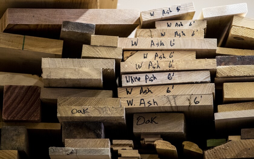 Stacks of wood wait for future projects at the Willmar Community Center