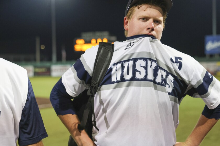 college men play baseball