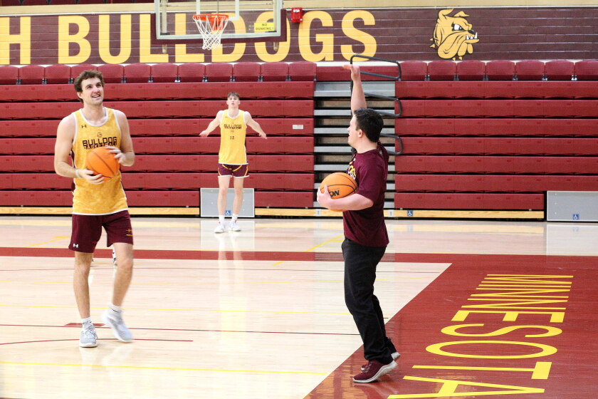 Jonah Renz Basketball Photos and video: Jonah Plys brings the energy for UMD men's basketball ...