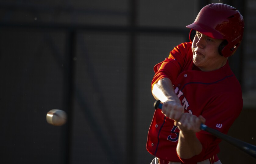 KMS player Isaac Rudningen hits the ball while playing Paynesville on the road Thursday, May 26, 2022.