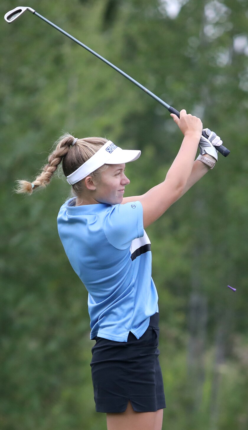 Superior’s Brynn Johnson watches her drive from the third tee box
