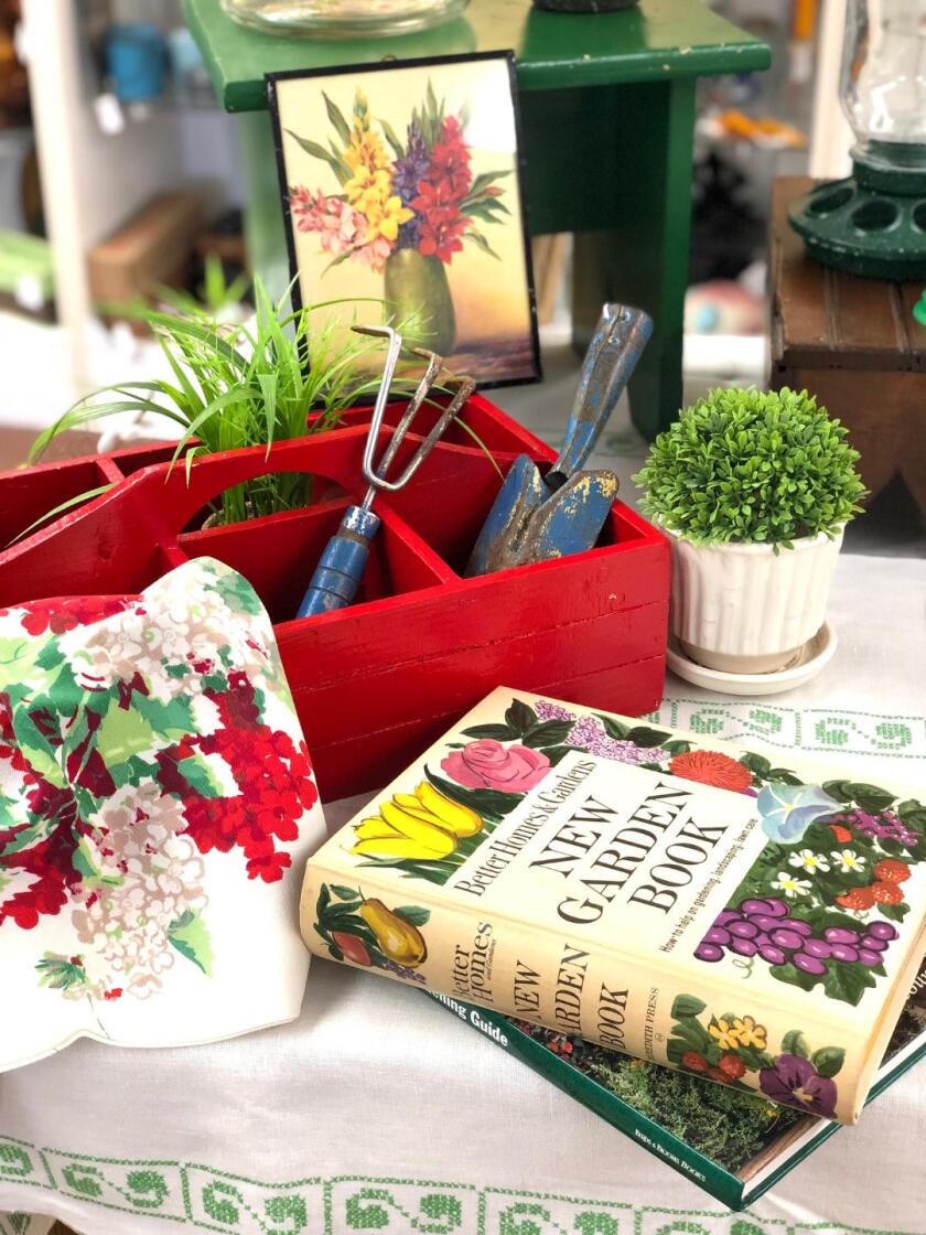 Books on gardening, tools, carryall for your tools and plants all found at the New Generations of Harmony..jpg