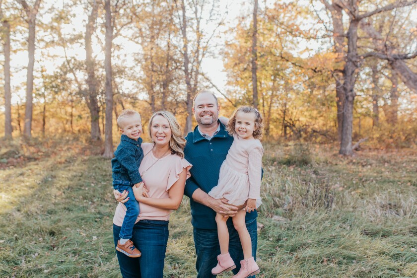 Kyle Rohlfs, his wife Tasha, and their two children, Reagan and Carson..jpg